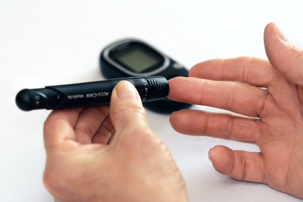 Diabetic checking blood sugar